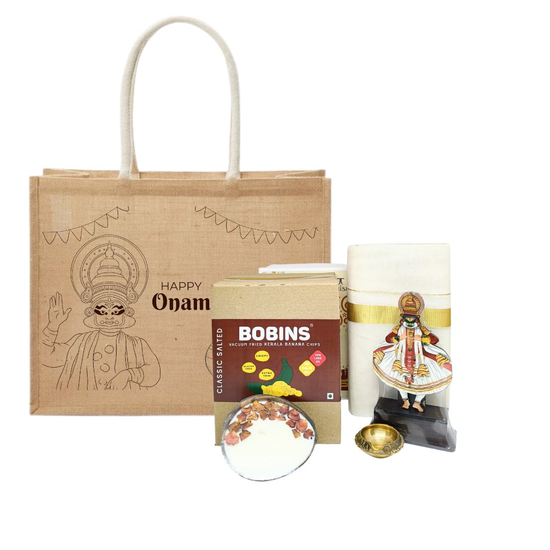 Kerala Onam Hamper – Jute Bag, Kasavu Mundu, Kathakali Showpiece, Brass Diya, Coconut Candle & Banana Chips